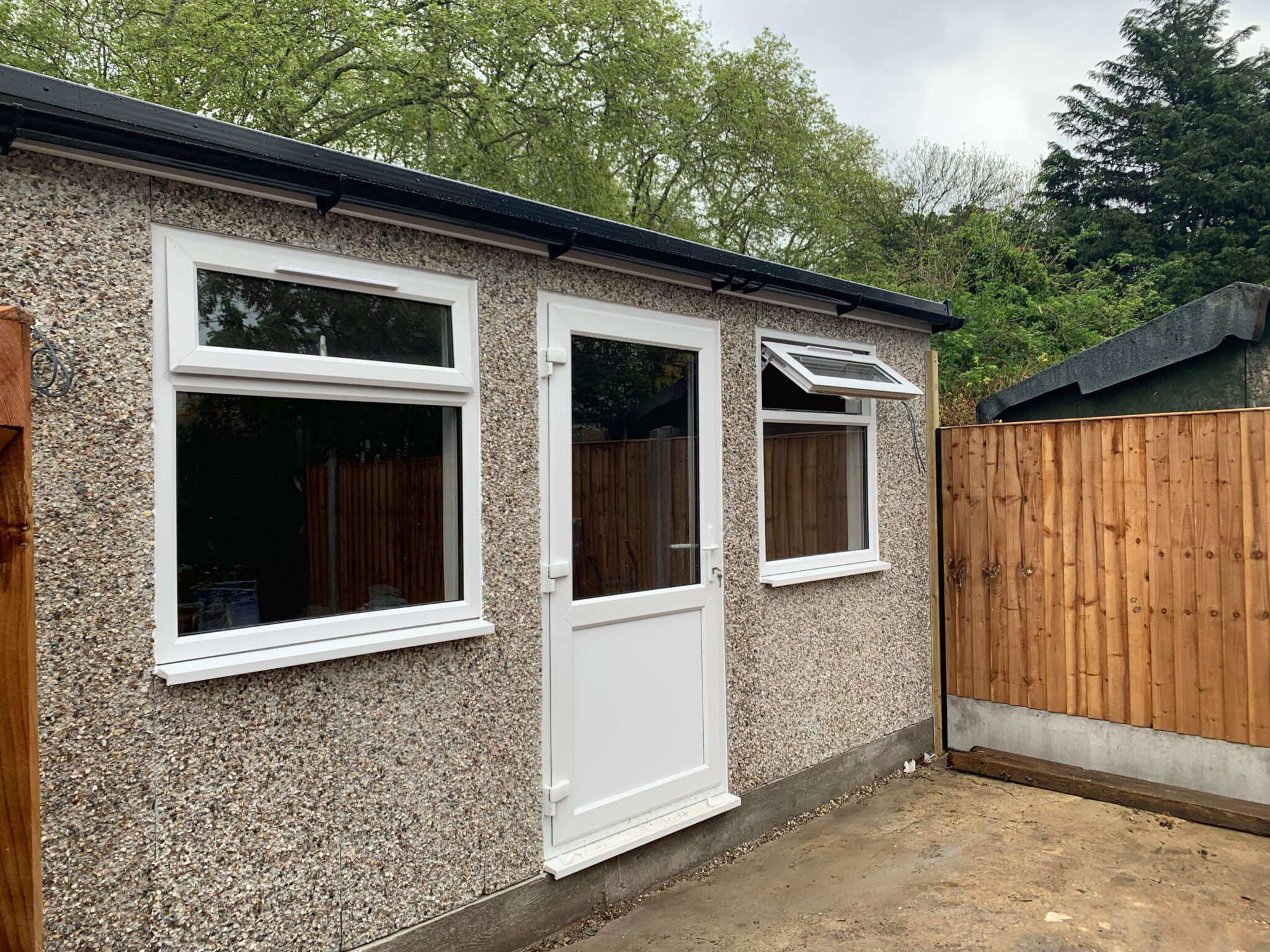 garden room concrete building pebbledash upvc door upvc windows 16 scaled