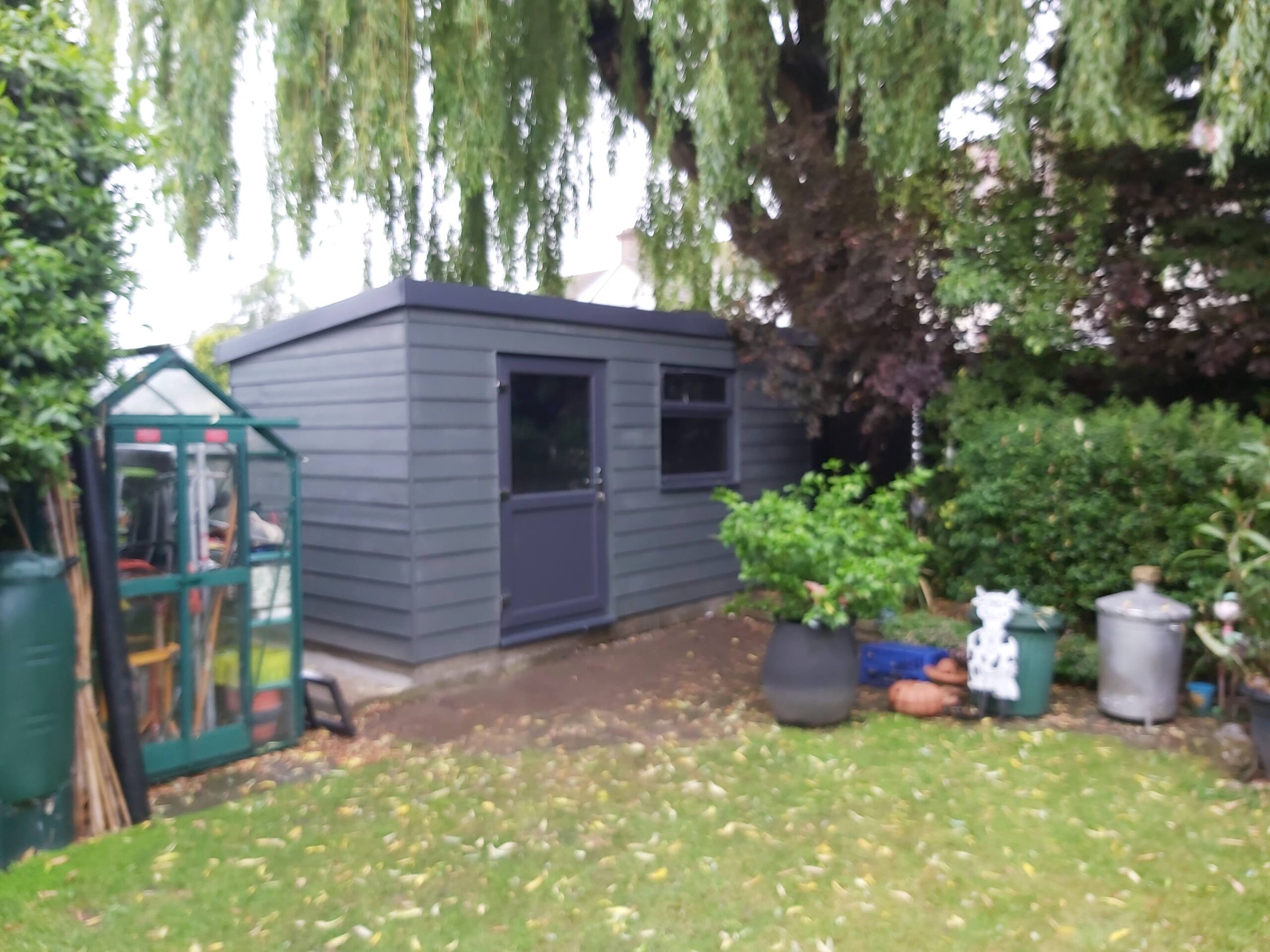 lean to back building hardieplank iron grey anthracite upvc half glazed door anthracite upvc window 02 scaled