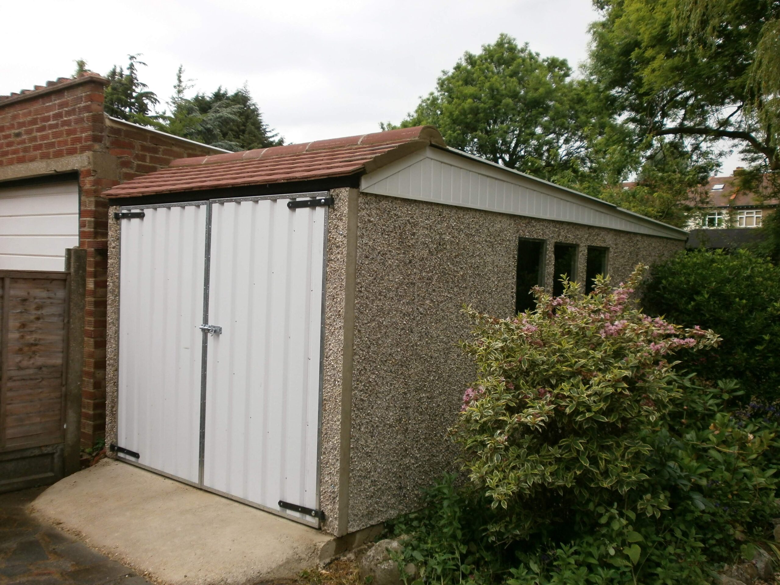 sandringham concrete building pebbledash plain roof tiles red steel pair doors 06 scaled